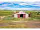 Open barn including surrounding ranch land and open fencing at 35675 Cheyenne Trl, Elizabeth, CO 80107
