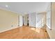 Large bedroom with built-in storage, hardwood floors, and ample natural light from the window at 35675 Cheyenne Trl, Elizabeth, CO 80107