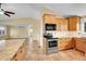 Spacious kitchen offers ample cabinet space, stainless steel appliances, and a functional layout at 35675 Cheyenne Trl, Elizabeth, CO 80107