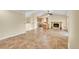 A spacious living room featuring fireplace, hardwood floors, and stairs at 35675 Cheyenne Trl, Elizabeth, CO 80107