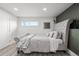 Serene bedroom with a plush bed and tranquil decor at 217 Douglas Fir Ave, Castle Rock, CO 80104