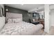 Comfortable bedroom with a cozy bed and soothing decor at 217 Douglas Fir Ave, Castle Rock, CO 80104