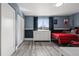 This bedroom features a window, closet, dresser, and laminate flooring at 217 Douglas Fir Ave, Castle Rock, CO 80104