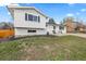 Beautiful exterior view of home and front yard with seating area at 217 Douglas Fir Ave, Castle Rock, CO 80104