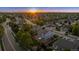 Aerial view of a beautiful home in a neighborhood at sunset at 7083 Winthrop Cir, Castle Rock, CO 80104