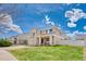 Charming two-story home featuring well-kept lawn, lovely front porch and a two-car garage at 21354 E 51St Ave, Denver, CO 80249