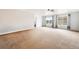 Expansive living room bathed in natural light from bright windows, perfect for entertaining at 21354 E 51St Ave, Denver, CO 80249
