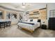 Cozy bedroom with a wood accent wall, desk and a beautiful view at 20190 Deer Shadow Way, Monument, CO 80132