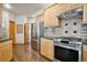 Kitchen featuring stainless steel appliances, including a refrigerator and range at 20190 Deer Shadow Way, Monument, CO 80132