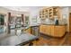 Open kitchen with stainless steel appliances, granite counters, and an adjacent dining area at 20190 Deer Shadow Way, Monument, CO 80132