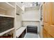 Organized walk-in closet with shelving, drawers, space for shoe storage and hanging clothes at 20190 Deer Shadow Way, Monument, CO 80132
