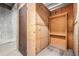 Unfinished basement storage room with shelving providing ample space at 955 Eudora St # 207E, Denver, CO 80220