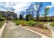 Well-manicured community space with walking paths, landscaping, and gathering spaces at 955 Eudora St # 207E, Denver, CO 80220