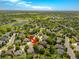 Aerial view showcasing a property in a neighborhood with nearby pond and green spaces at 10859 Irving Ct, Westminster, CO 80031