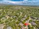Aerial view of a property within a neighborhood near a golf course at 10859 Irving Ct, Westminster, CO 80031