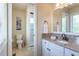 Well-lit bathroom featuring a granite-topped vanity and walk-in glass shower at 10859 Irving Ct, Westminster, CO 80031