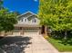 Charming two-story home featuring a spacious three-car garage and lush landscaping at 10859 Irving Ct, Westminster, CO 80031