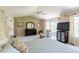 Primary bedroom with a chair, television and bay window at 10859 Irving Ct, Westminster, CO 80031