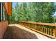 Spacious wooden deck surrounded by trees, perfect for outdoor entertaining at 422 Fairview Blvd, Breckenridge, CO 80424