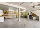 Large unfinished basement with concrete floor, windows for natural light, and ample space for storage or customization at 422 Fairview Blvd, Breckenridge, CO 80424