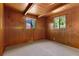 Cozy bedroom with carpet and wooden paneling at 422 Fairview Blvd, Breckenridge, CO 80424