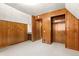 Carpeted bedroom featuring wood paneled walls and a closet at 422 Fairview Blvd, Breckenridge, CO 80424