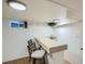 A cozy bar area featuring two bar stools, a sink and a serving counter at 5886 Urban St, Arvada, CO 80004