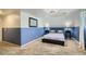 Cozy bedroom featuring plush carpet, a comfortable bed, and neutral-toned walls for a relaxing atmosphere at 5886 Urban St, Arvada, CO 80004
