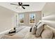 Bright bedroom featuring a comfy bed, plush pillows, and natural light, perfect for relaxing at 9885 Thornbury Way, Highlands Ranch, CO 80129