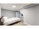 Bedroom with neutral paint, carpet and an egress window at 8438 Ames St, Arvada, CO 80003