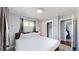 Comfortable bedroom with closet and doorway at 8438 Ames St, Arvada, CO 80003