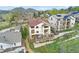 Stunning aerial view of the property highlighting its spacious layout and mountain scenery at 415 Butte Pkwy, Golden, CO 80403