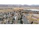 Aerial view showcasing the house's setting and proximity to amenities at 11997 W Coal Mine Dr, Littleton, CO 80127