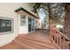 Wooden back deck perfect for outdoor entertaining or quiet relaxation at 11997 W Coal Mine Dr, Littleton, CO 80127