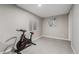 Bright exercise room with bike, and natural light, perfect for at home workouts at 11997 W Coal Mine Dr, Littleton, CO 80127