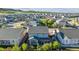 Aerial view of a neighborhood showcasing lush greenery, well-maintained homes, and beautiful landscaping at 6616 Amur Ln, Castle Rock, CO 80108