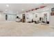 Large finished basement with bar area and workout area at 6616 Amur Ln, Castle Rock, CO 80108