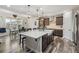 Open-concept kitchen with stainless appliances and an eat-in dining area at 6616 Amur Ln, Castle Rock, CO 80108