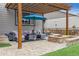 Outdoor patio with a pergola, fire pit, and a seating area, perfect for entertaining at 6616 Amur Ln, Castle Rock, CO 80108