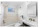 Clean bathroom with a bathtub, shower, and updated vanity at 36 N Emerson St # 203, Denver, CO 80218