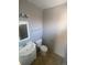 Updated half bathroom with vanity and toilet at 1240 Russell Blvd, Thornton, CO 80229