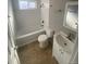 Clean bathroom with bathtub, toilet, and vanity at 1240 Russell Blvd, Thornton, CO 80229