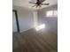 Bright bedroom with ceiling fan and neutral decor at 1240 Russell Blvd, Thornton, CO 80229