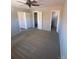 Large bedroom with carpet and ceiling fan at 1240 Russell Blvd, Thornton, CO 80229