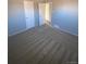 Spacious carpeted bedroom with neutral walls at 1240 Russell Blvd, Thornton, CO 80229