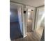 Hallway with doors to bedrooms and bathroom at 1240 Russell Blvd, Thornton, CO 80229