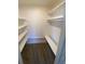 Well-lit pantry with ample shelving for storage at 1240 Russell Blvd, Thornton, CO 80229
