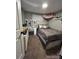 Cozy bedroom offers a relaxing retreat, with plush carpet and soothing wall color at 7115 Harold St # 2, Fort Lupton, CO 80621
