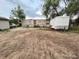 Exterior view of property with ample parking and convenient storage at 7115 Harold St # 2, Fort Lupton, CO 80621