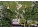 Aerial view of the property with outlined boundary showcasing mature trees at 452 Gordon Dr, Castle Rock, CO 80104